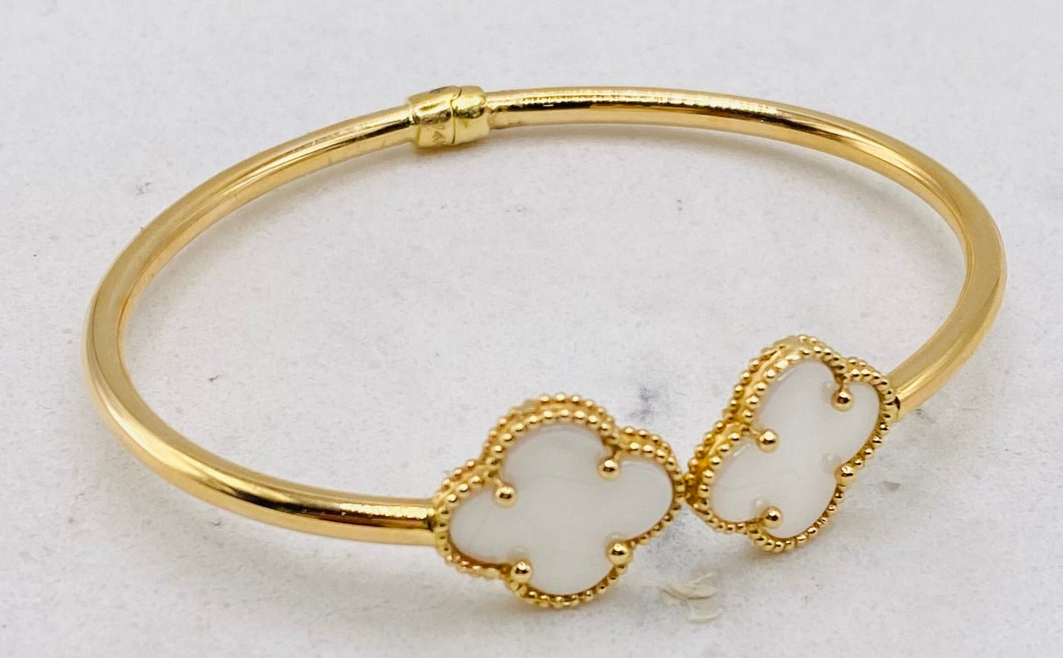 Pulsa tipo vancleef talla18,  14k