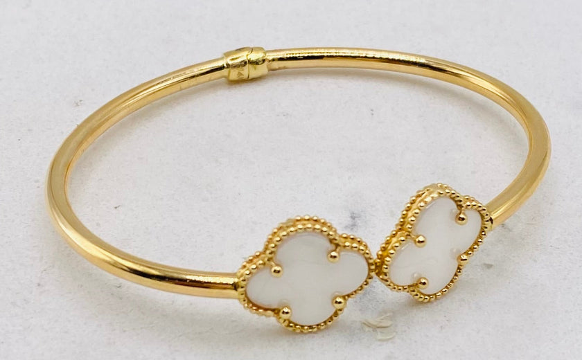 Pulsa tipo vancleef talla18,  14k