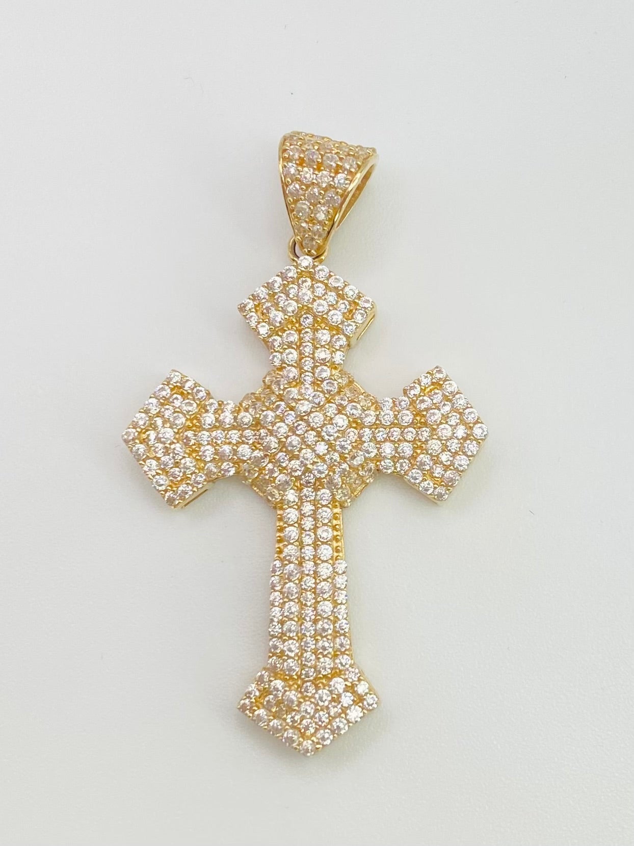 Medalla cruz zirconia 14k.