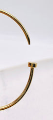 Pulsa tipo clavo 14k, talla 17