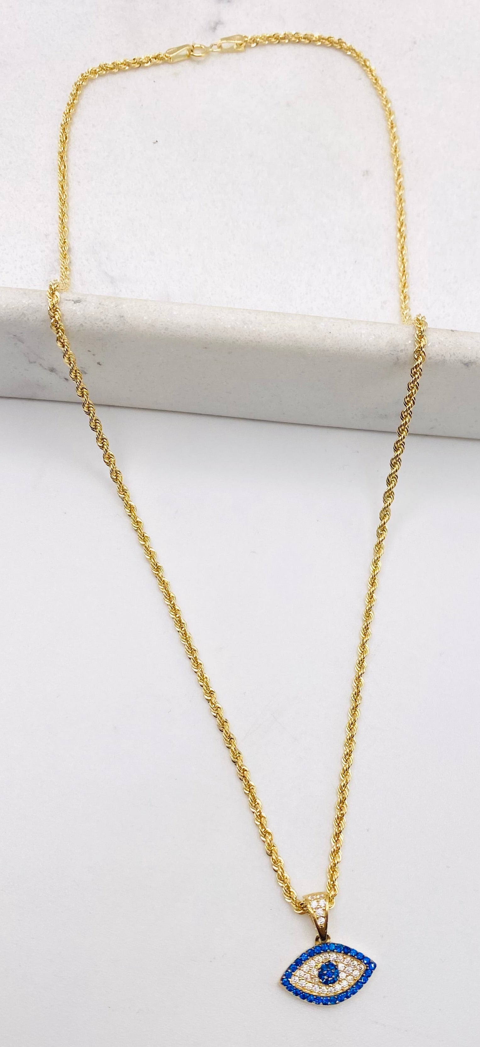 Cadena + medalla ojo turco 18k