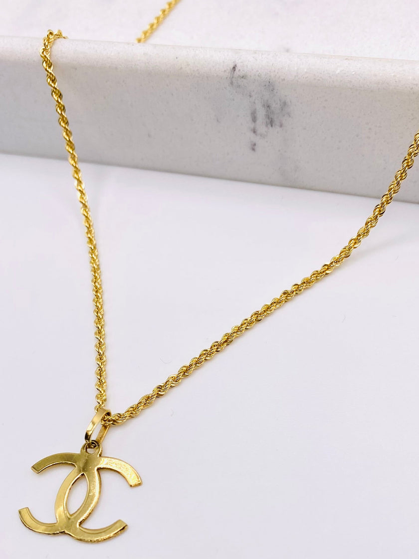 Cadena medalla Chanel 18k