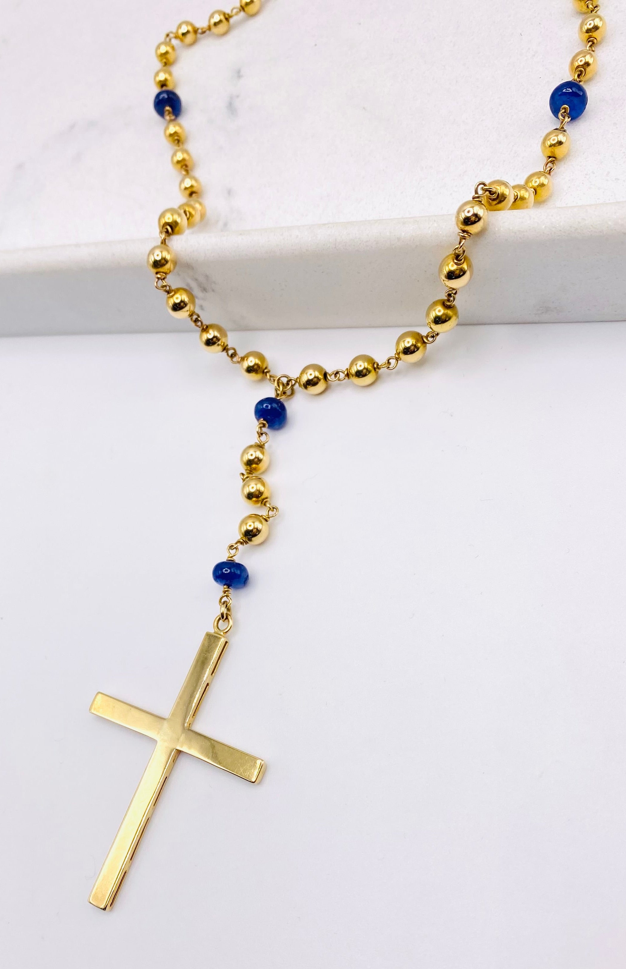 Crucifijo bolita azul 18k,  56cm x 5.4mm